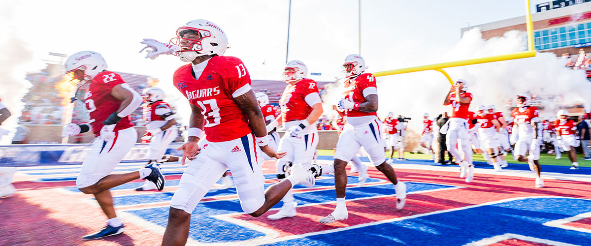 South Football team running out to the field.