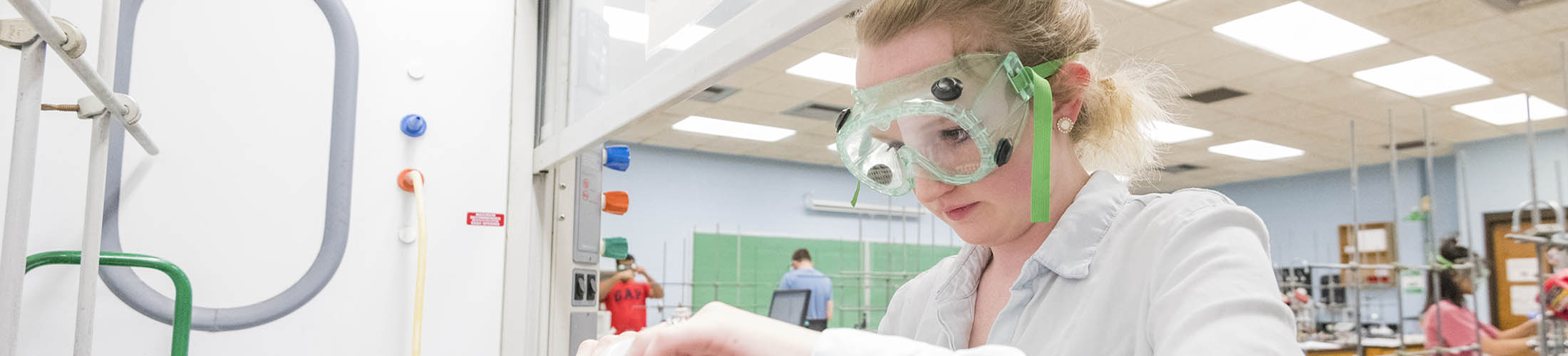 Student working in lab on campus.