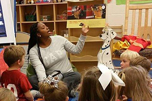 Student teacher reading to class.