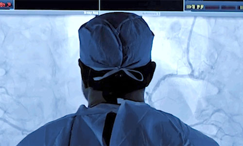 student looking at an x ray