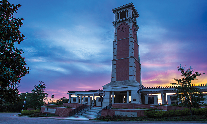 Moulton Tower with a multi colored sky in background