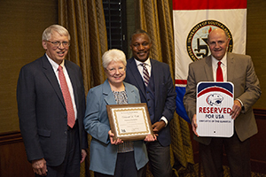 President Tony Waldrop; Deborah Cobb, award recipient; Board Chair, Ken Simon; and Gerald Gattis, AVP for Finance & Administration for Human Resources. 