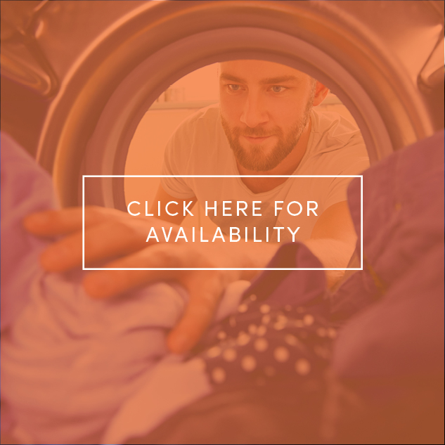 man looking in dryer