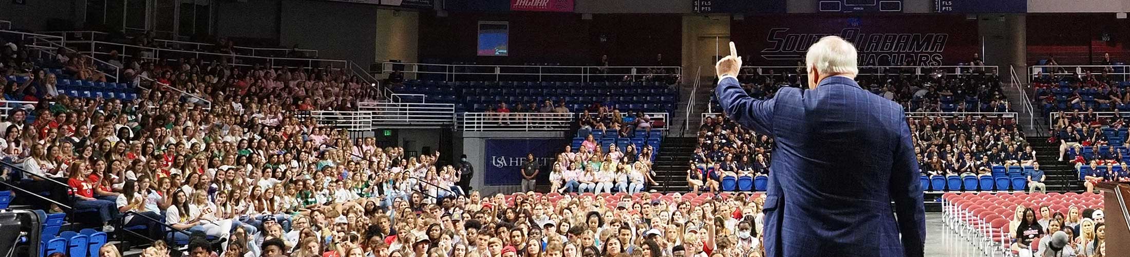 President Bonner holding up J sign.