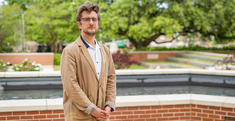 Dr. Anton Svynarenko, a visiting assistant professor of Russian in the Department of Modern and Classical Languages and Literature at the University of South Alabama is from Kharkiv, Ukraine, a city left heavily damaged by the Russian invasion. He says, having the support of faculty, staff and students during this very difficult time has been encouraging. data-lightbox='featured'