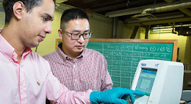 Shenghua Wu received a 2018 FDCG award for his work on innovative asphalt mixtures. In the photo, Omar Tahri, left, a civil engineering junior from Morocco, works side by side with Assistant Professor Dr. Shenghua Wu in the asphalt lab.